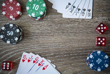 Gambling chips frame on Blue card table backgroundの写真素材