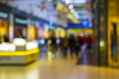 Abstract Blurred shopping mall background with Christmas decorationsの写真素材