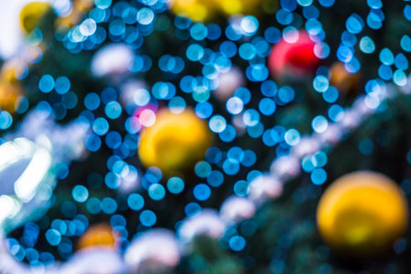 Abstract shot. Christmas festive bright background with huge Christmas Tree with Christmas balls decorations.の写真素材