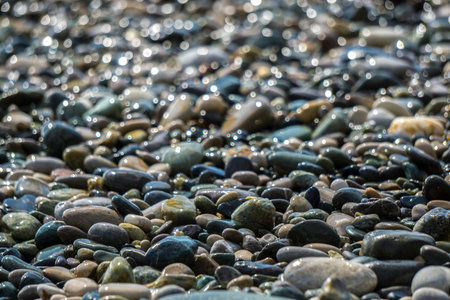 Soft focused blurred picture of a peebles on the beach