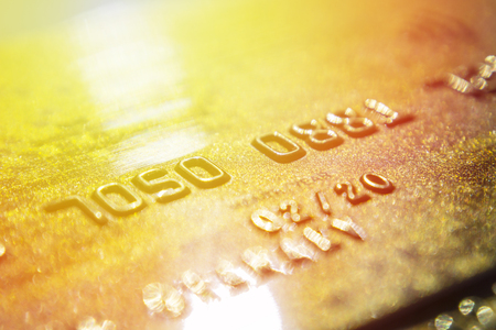 Gold credit cards close up. Macro shot smart card, credit card.の写真素材