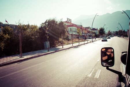 The road in the mountains. The car rides on the highway.の写真素材
