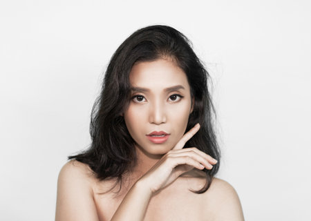 Girl's face Show facial organs and skin on a white background under the concept of beauty, cosmetic products and women.の写真素材