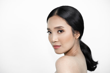 Girl's face Show facial organs and skin on a white background under the concept of beauty, cosmetic products and women.の写真素材