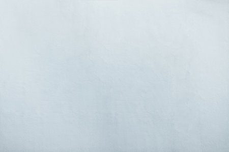 white cement wall with small detail textureの写真素材