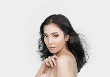 Girl's face Show facial organs and skin on a white background under the concept of beauty, cosmetic products and women.の写真素材