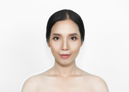 Girl's face Show facial organs and skin on a white background under the concept of beauty, cosmetic products and women.の写真素材