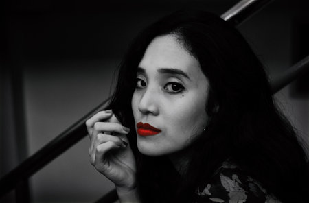 Close-up of the woman's face and red lips and black and white retro imageの写真素材
