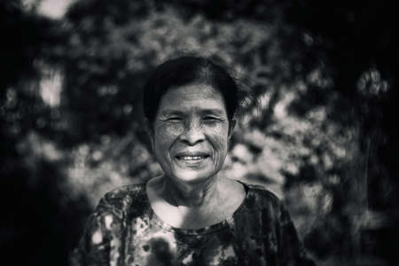 Hoi An, Vietnam - July 22 2016: Very Old Vietnamese Woman smiling for a camera,Hoi An a City Near Da Nang Vietnam,Old woman dramatic potraitのeditorial素材