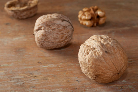 Walnuts on wooden table top