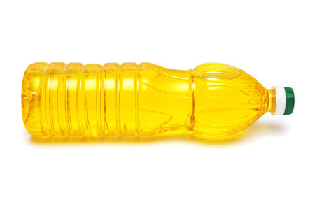 Bottle with sunflower oil on a white background