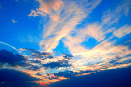 Beautiful colorful clouds and sky at sunsetの写真素材