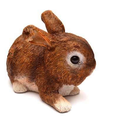 Statuette of a hare isolated on white backgroundの写真素材