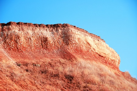 Clay mountain on a background of blue skyの写真素材
