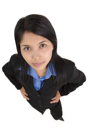 A young business woman in akimbo pose.の写真素材