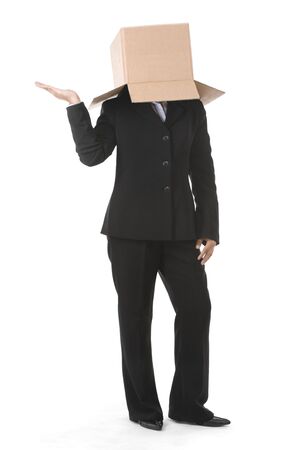 A businesswoman positioned her hand like offering something with her head covered with a box. You can draw smiley or angry face on the box surface.の写真素材