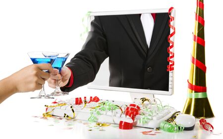 Toast between people inside computer screen and outside using blue martini. Confetti scattered around the computer.の写真素材