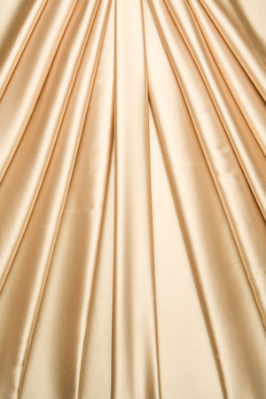 The golden satin in curtain pattern, which can be use for background, card design, etc.の写真素材