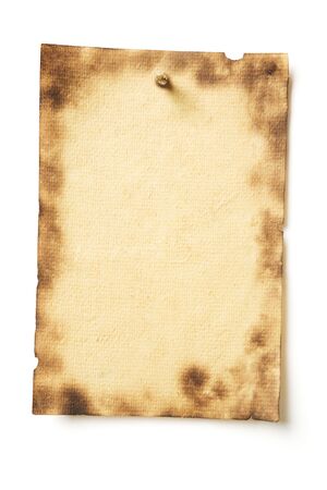 Photo of grunge parchment nailed with spike isolated on whiteの写真素材