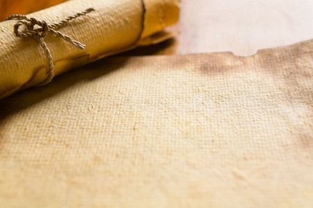 Old blank paper on wooden tableの写真素材