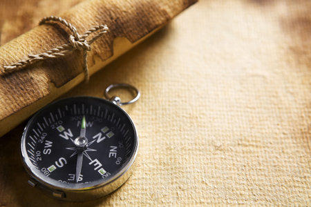 Compas and scroll on old paperの写真素材