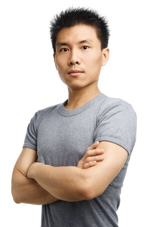 Studio shot of a fitness Asian young manの写真素材