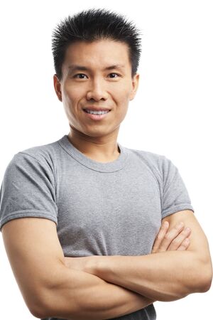 Studio shot of a fitness Asian young manの写真素材