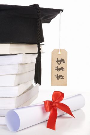 Concept of expensive education that diploma with tassel and price tagの写真素材