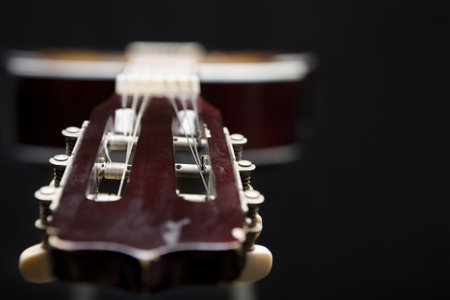 Classic guitar in darkの写真素材