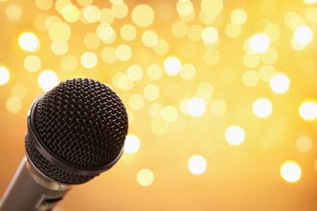 Microphone with blur light for Christmas or New year eventの写真素材