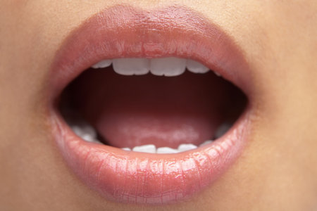 Woman's mouth open, ready to eat or receive something