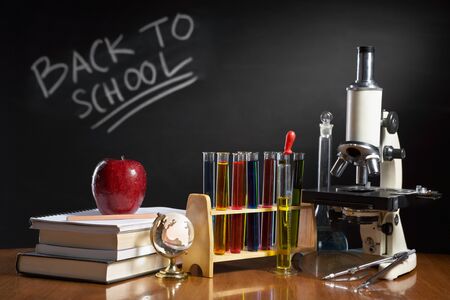 Back to school concept with item represent each subject in school, biology, geography, mathematics, chemistry, literature, etcの写真素材