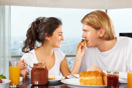 Couple enjoying their time together during breakfast timeの写真素材
