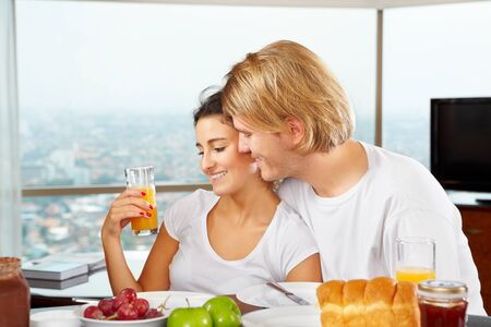 Couple enjoying their time together during breakfast timeの写真素材
