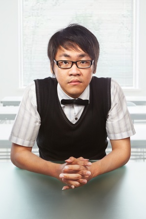 Chinese collage male student pose to the cameraの写真素材