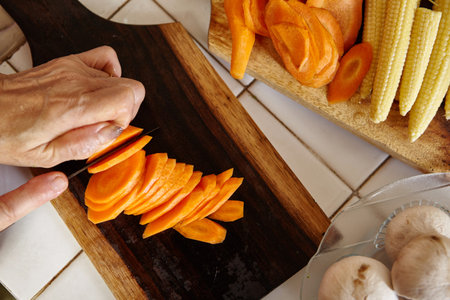 Hand cutting vegetable for use in cooking
