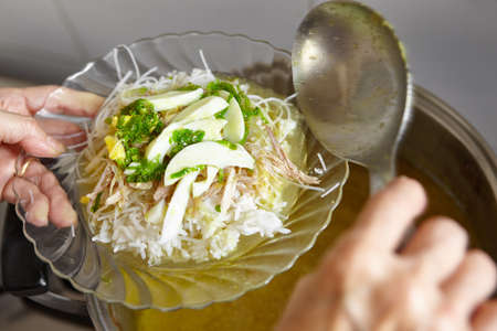 Soto, one of traditional Indonesia chicken soup with many herbs and spicesの写真素材
