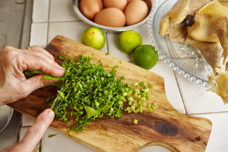 Chopping parsley for cooking ingredient in the next stepの写真素材