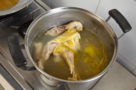 Chiocken and the stock soup for next step cookingの写真素材