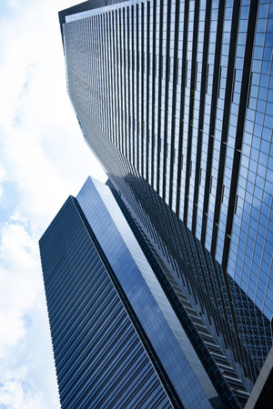 Commercial building in business disctrict of Singapore at noonの写真素材