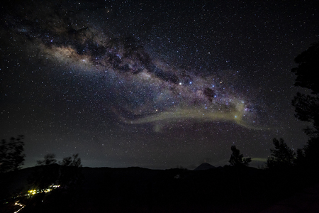 Milky way on dark night in Indonesia mountain rangeの写真素材