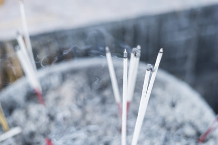 burning incenses in the templeの写真素材