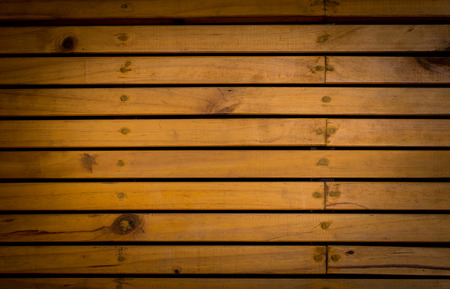 dark brown old wood texture with knotの写真素材