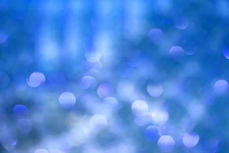 abstract background consisting of many highlights of blue color, like the underwater worldの写真素材