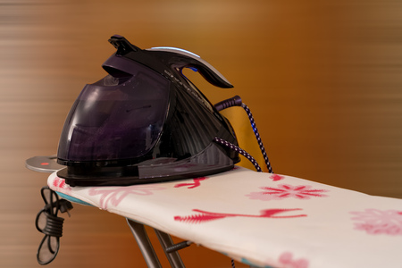 Ironing station on an ironing boardの写真素材