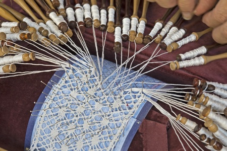 Traditional lace making with bobbinsの写真素材