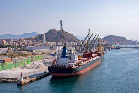 Port of Alicante, Spain with freighter in foreground