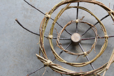 Rings of twisted vines and sticks sculpture; close up view