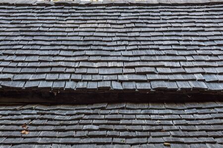 Wood shingle roof exterior detail from an old Appalachian log cabin, horizontal aspectの写真素材