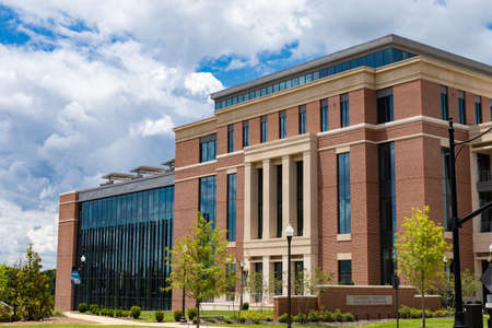 AUBURN ALABAMA, USA - JUNE 18, 2020 - Raymond J Harbert College of Business building exterior on the Auburn University campusのeditorial素材